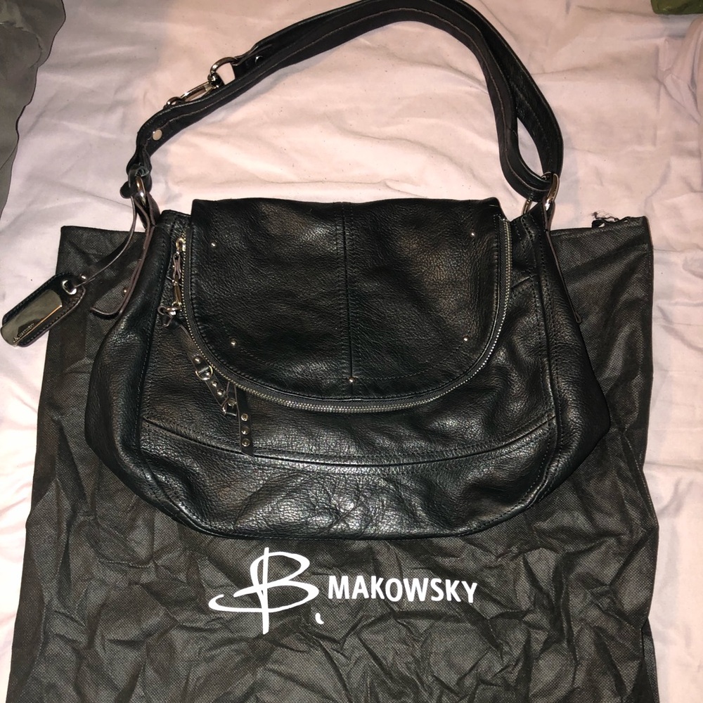 B Makowsky medium size black pebbled leather bag.